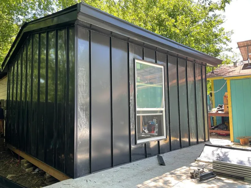 Black standing seam metal wall panels for Metal Roof Installation in Gulf Shores